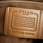 coach bag business in a luxurious brown color