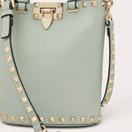 ROCKSTUD CROSSBODY POUCH IN GRAINY CALFSKIN