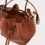 ROCKSTUD GRAINY CALFSKIN BUCKET BAG