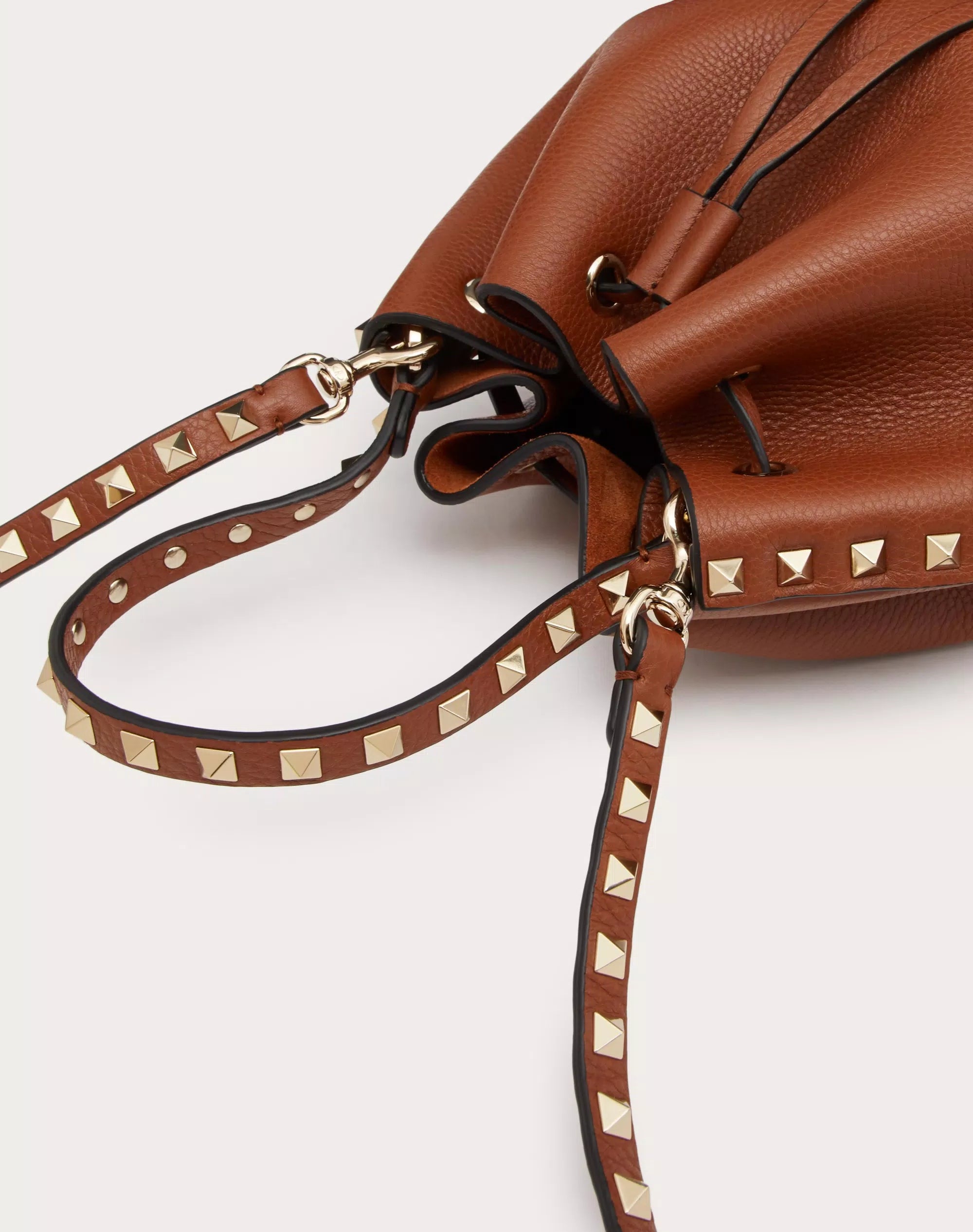 ROCKSTUD GRAINY CALFSKIN BUCKET BAG