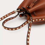 ROCKSTUD GRAINY CALFSKIN BUCKET BAG