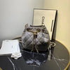 CHANEL Lambskin Quilted CC Dweller Drawstring Bucket Bag Light Grey