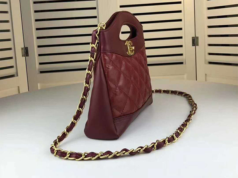 CHANEL SHOPPING BAG CALFSKIN & GOLDEN TONE METAL BURGUNDY