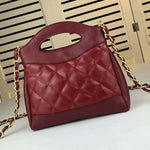 CHANEL SHOPPING BAG CALFSKIN & GOLDEN TONE METAL BURGUNDY