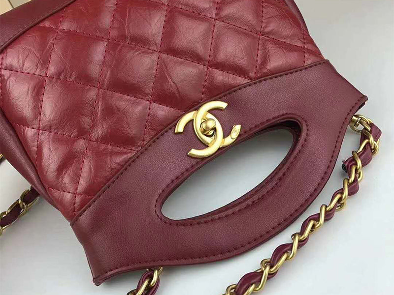 CHANEL SHOPPING BAG CALFSKIN & GOLDEN TONE METAL BURGUNDY