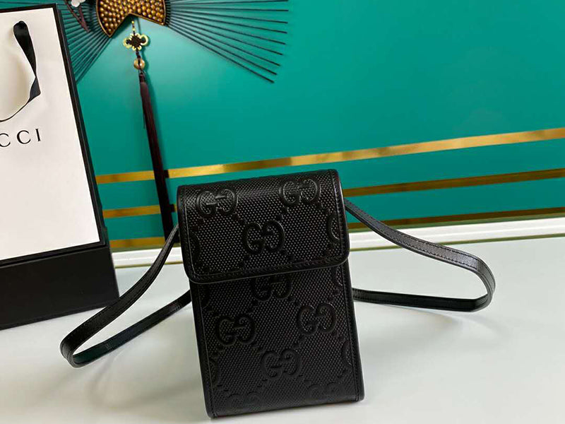 GUCCI GG EMBOSSED MINI BAG BLACK 625571