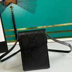 GUCCI GG EMBOSSED MINI BAG BLACK 625571