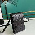 GUCCI GG EMBOSSED MINI BAG BLACK 625571