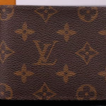 LOUIS VUITTON MONOGRAM CANVAS MULTIPLE WALLET M60895