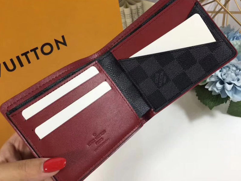 LOUIS VUITTON TAIGA LEATHER MULTIPLE WALLET M30563