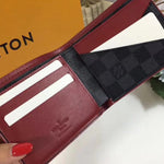 LOUIS VUITTON TAIGA LEATHER MULTIPLE WALLET M30563