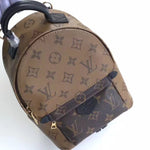 LOUIS VUITTON MONOGRAM REVERSE CANVAS PALM SPRINGS BACKPACK MINI M42411