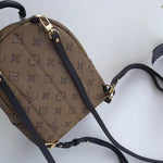 LOUIS VUITTON MONOGRAM REVERSE CANVAS PALM SPRINGS BACKPACK MINI M42411