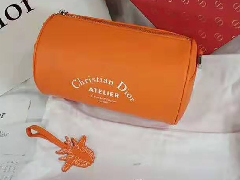 DIOR ROLLER POUCH IN DENIM GRAINED CALFSKIN ORANGE