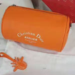 DIOR ROLLER POUCH IN DENIM GRAINED CALFSKIN ORANGE