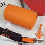 DIOR ROLLER POUCH IN DENIM GRAINED CALFSKIN ORANGE