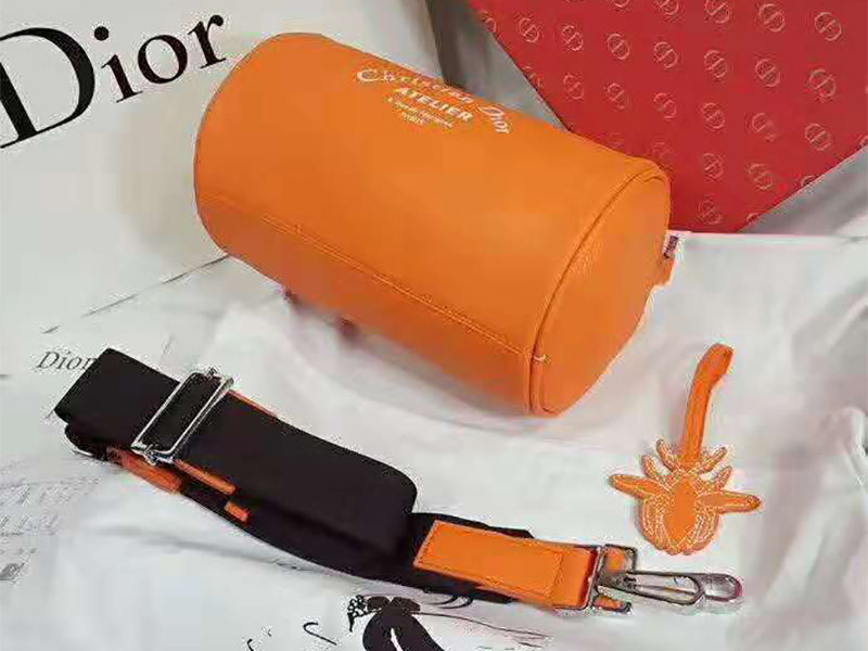 DIOR ROLLER POUCH IN DENIM GRAINED CALFSKIN ORANGE