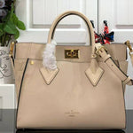 LOUIS VUITTON ON MY SIDE CALF LEATHER CREAM M53823