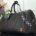 LOUIS VUITTON TAURILLON LEATHER KEEPALL BANDOULIÈRE 45 BLACK