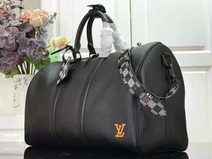 LOUIS VUITTON TAURILLON LEATHER KEEPALL BANDOULIÈRE 45 BLACK