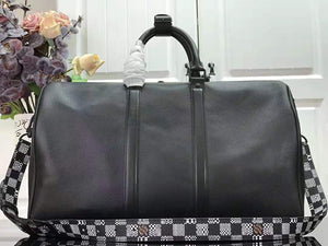 LOUIS VUITTON TAURILLON LEATHER KEEPALL BANDOULIÈRE 45 BLACK