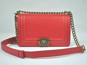 BOY CHANEL FLAP BAG IN GLAZED CALFSKIN RED IN BRONZE HARDWARE