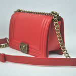 BOY CHANEL FLAP BAG IN GLAZED CALFSKIN RED IN BRONZE HARDWARE