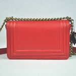 BOY CHANEL FLAP BAG IN GLAZED CALFSKIN RED IN BRONZE HARDWARE