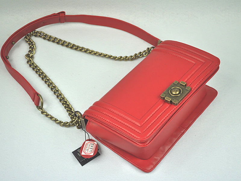 BOY CHANEL FLAP BAG IN GLAZED CALFSKIN RED IN BRONZE HARDWARE