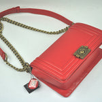 BOY CHANEL FLAP BAG IN GLAZED CALFSKIN RED IN BRONZE HARDWARE