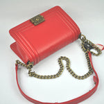 BOY CHANEL FLAP BAG IN GLAZED CALFSKIN RED IN BRONZE HARDWARE