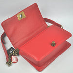 BOY CHANEL FLAP BAG IN GLAZED CALFSKIN RED IN BRONZE HARDWARE