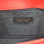 BOY CHANEL FLAP BAG IN GLAZED CALFSKIN RED IN BRONZE HARDWARE