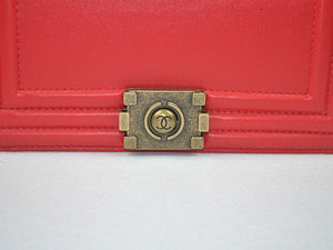 BOY CHANEL FLAP BAG IN GLAZED CALFSKIN RED IN BRONZE HARDWARE